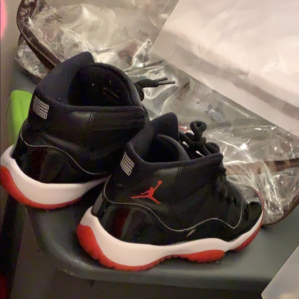 Size 7y deadstock bred 11s shoot an offer shoes are clean just minor creasings